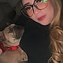 Hazel joined the competition — help win amazing prizes! woman, glasses, long_hair, curly_hair, dog, french_bulldog, pet, collar, red_collar, indoor, dim_light, selfie, portrait, face, animal, companion, snuggling, relaxed, comfort, casual