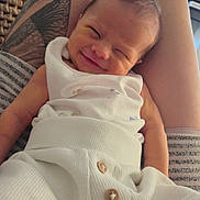 Beau joined the competition — help win amazing prizes! baby, smile, infant, tattoo, clothing, person, skin, white, buttons, closeup, cute, newborn, arm, leg, indoor, fabric, face, expression, human, resting