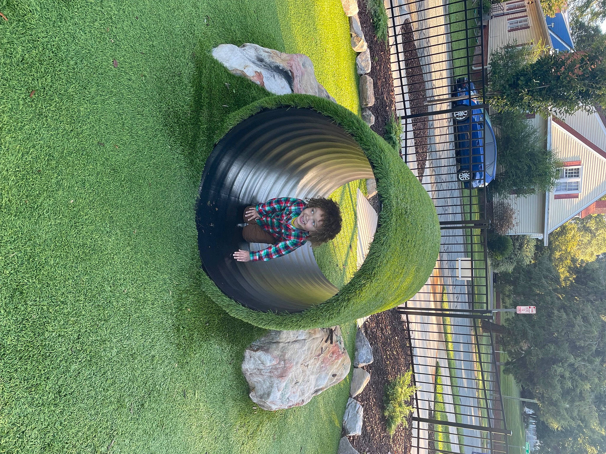 Kai is registered to the contest to win money with this photo: art, auto_part, automotive_wheel_system, circle, electric_blue, garden, grass, green, joy, landscape, leisure, person, plant, reflection, terrestrial_plant, tree, urban_design