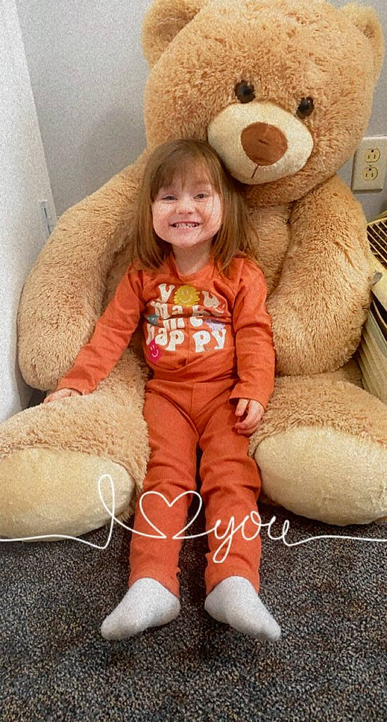 Samara is registered to the contest to win money with this photo: child, comfort, couch, fun, fur, happy, head, human_body, human_leg, joy, mammal, organ, person, plush, skin, sleeve, smile, stuffed_toy, teddy_bear, textile