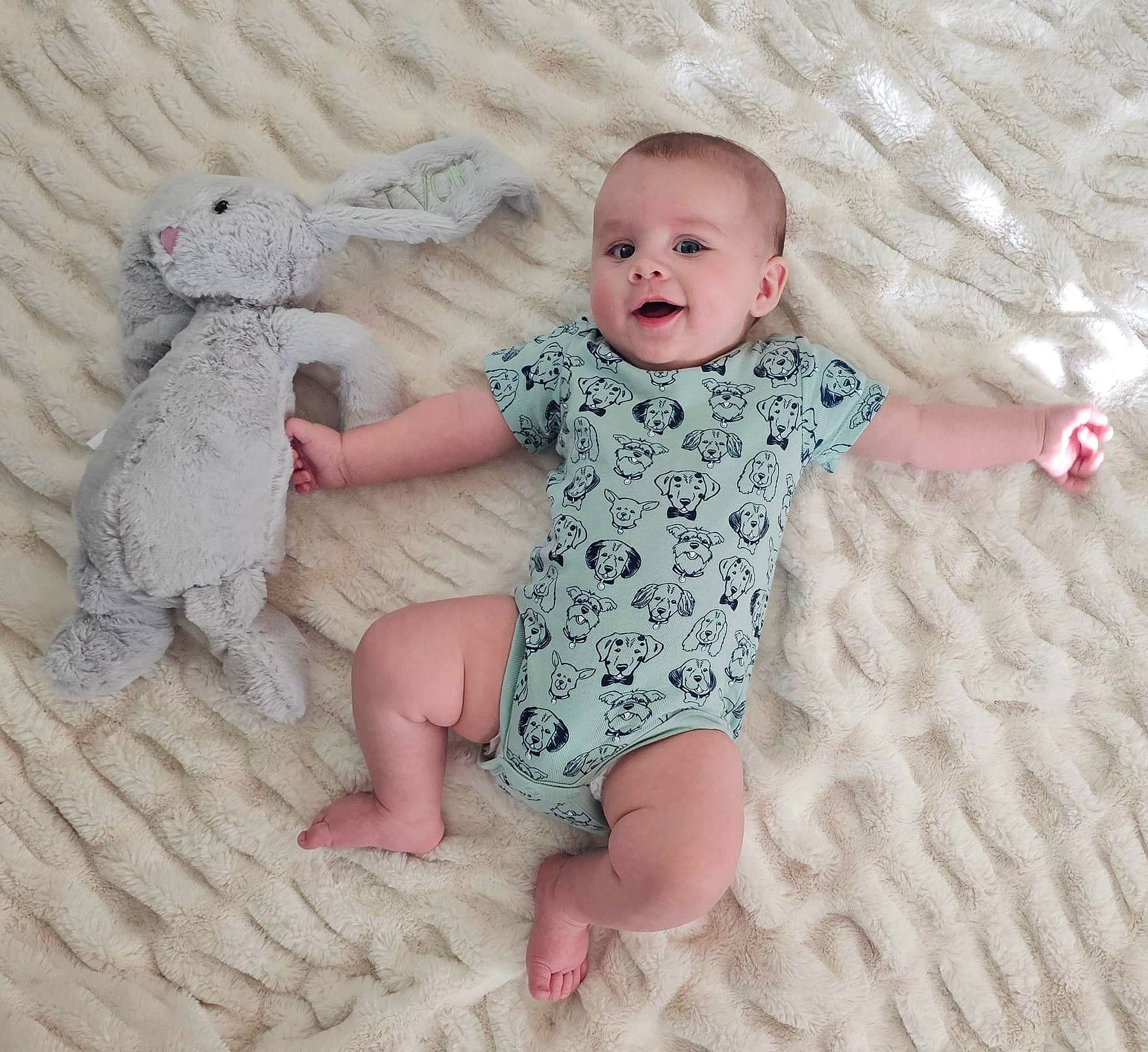 Ivan joined the competition — help win amazing prizes! arm, baby, baby_toddler_clothing, barefoot, child, comfort, finger, flooring, foot, head, linens, pattern, person, pink, skin, sleeve, textile, thumb, toddler, toy