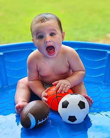 Ivan is registered to the contest to win money with this photo: ball, bathing, blue, chest, football, fun, games, grass, happy, leisure, person, photograph, player, recreation, soccer, soccer_ball, sports, sports_equipment, sports_gear, surprise