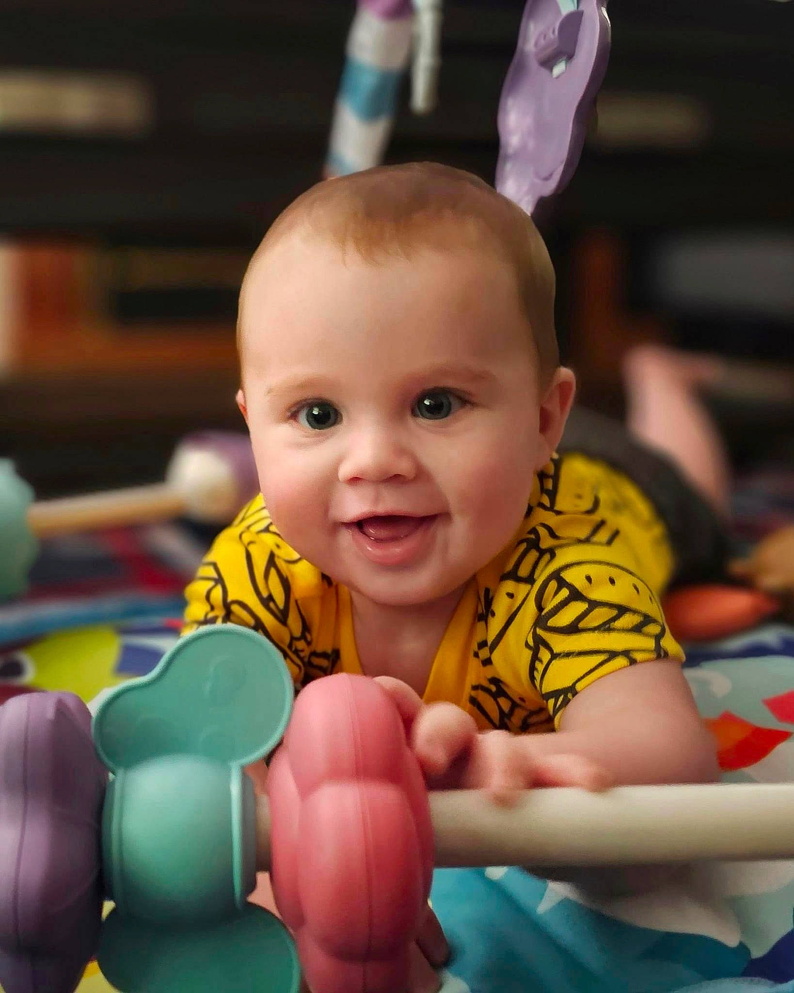 Ivan is registered to the contest to win money with this photo: baby, baby_playing_with_toys, baby_products, beauty, cheek, child, eye, facial_expression, finger, fun, gesture, happy, joy, leisure, organ, people, person, product, skin, smile