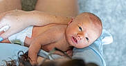 Easton joined the competition — help win amazing prizes! arm, baby, caring, child, closeup, comfort, diaper, eyes, face, hand, holding, human, infant, love, newborn, parent, person, portrait, skin, toddler