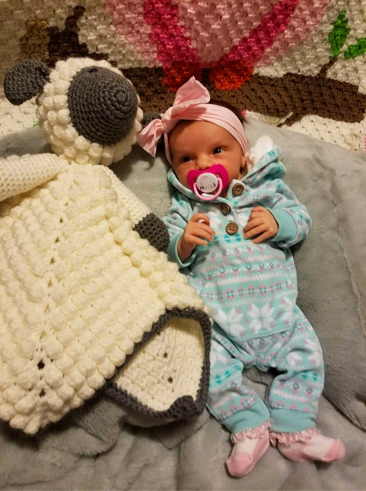 Blakeley is registered to the contest to win money with this photo: art, baby, beige, child, craft, crochet, doll, headwear, knitting, pattern, person, teddy_bear, toddler, toy, wool, woolen
