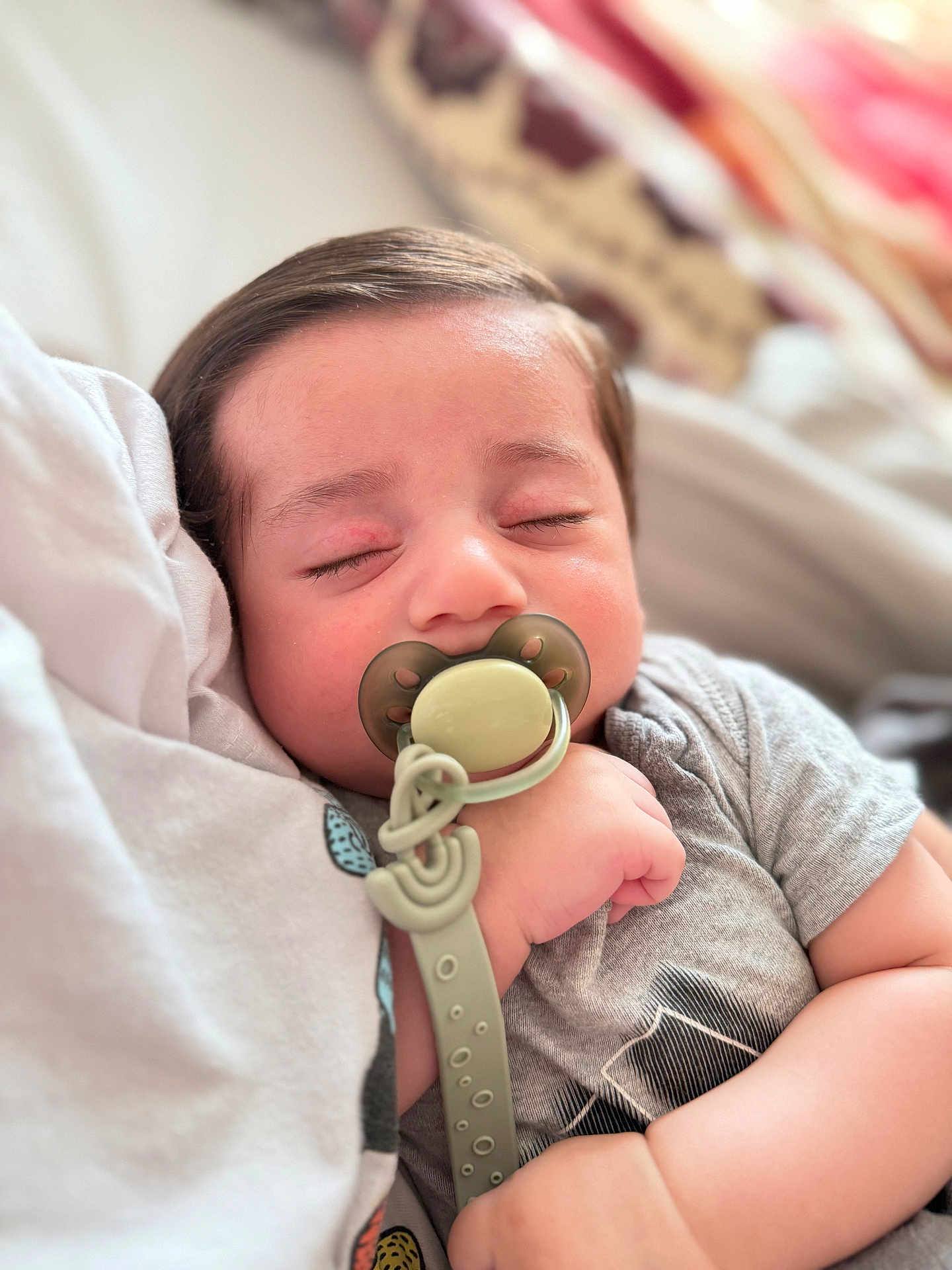 Issa joined the competition — help win amazing prizes! baby, pacifier, sleeping, child, infant, hand, clothing, blanket, closeup, face, peaceful, cute, soft, resting, indoor, person, toddler, skin, pale, young