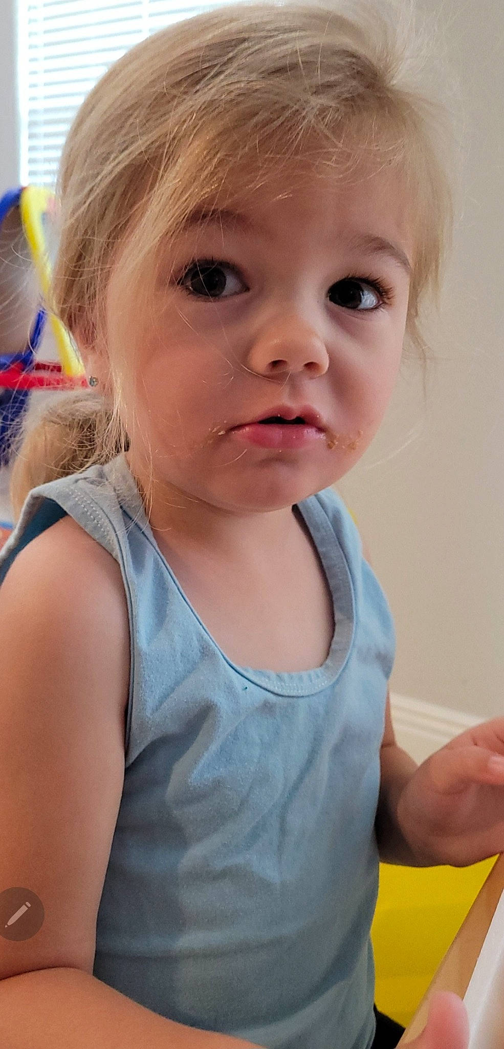 Liberty is registered to the contest to win money with this photo: baby_toddler_clothing, blond, cheek, child, chin, ear, eyebrow, eyelash, facial_expression, finger, gesture, happy, iris, lip, neck, nose, person, skin, sleeve, t_shirt