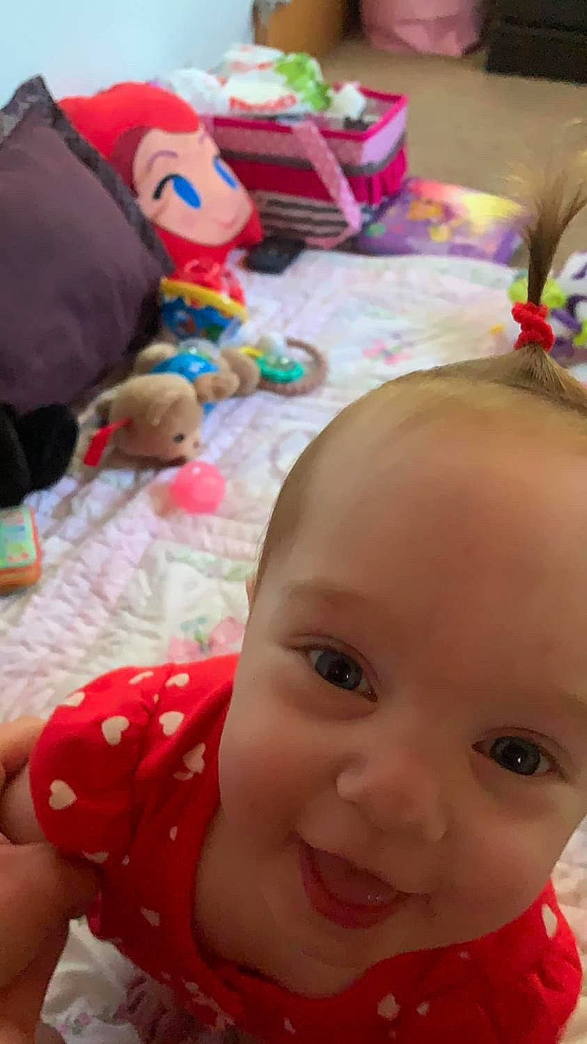 Avery is registered to the contest to win money with this photo: baby, baby_toddler_clothing, cheek, eyebrow, forehead, fun, happy, head, iris, joy, lip, mammal, mouth, nose, person, photograph, pink, skin, smile, textile