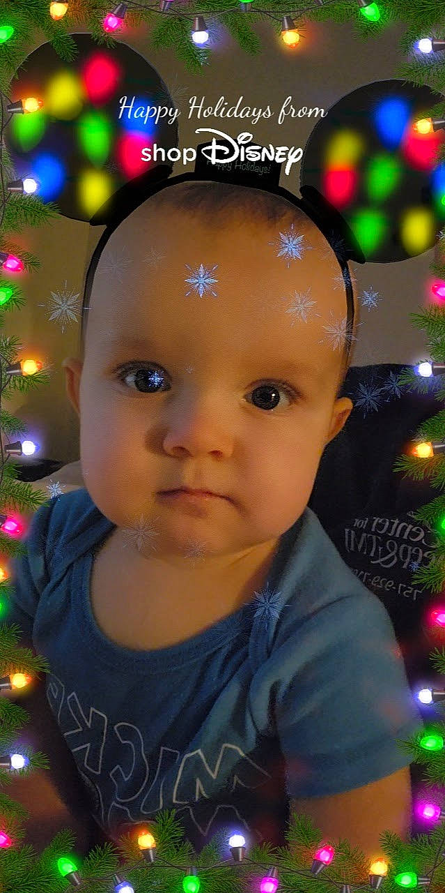 Azrael is registered to the contest to win money with this photo: adaptation, cheek, child, christmas_tree, event, eye, eyelash, facial_expression, flash_photography, fun, hair, hairstyle, happy, head, holiday, human, iris, light, person, snapshot