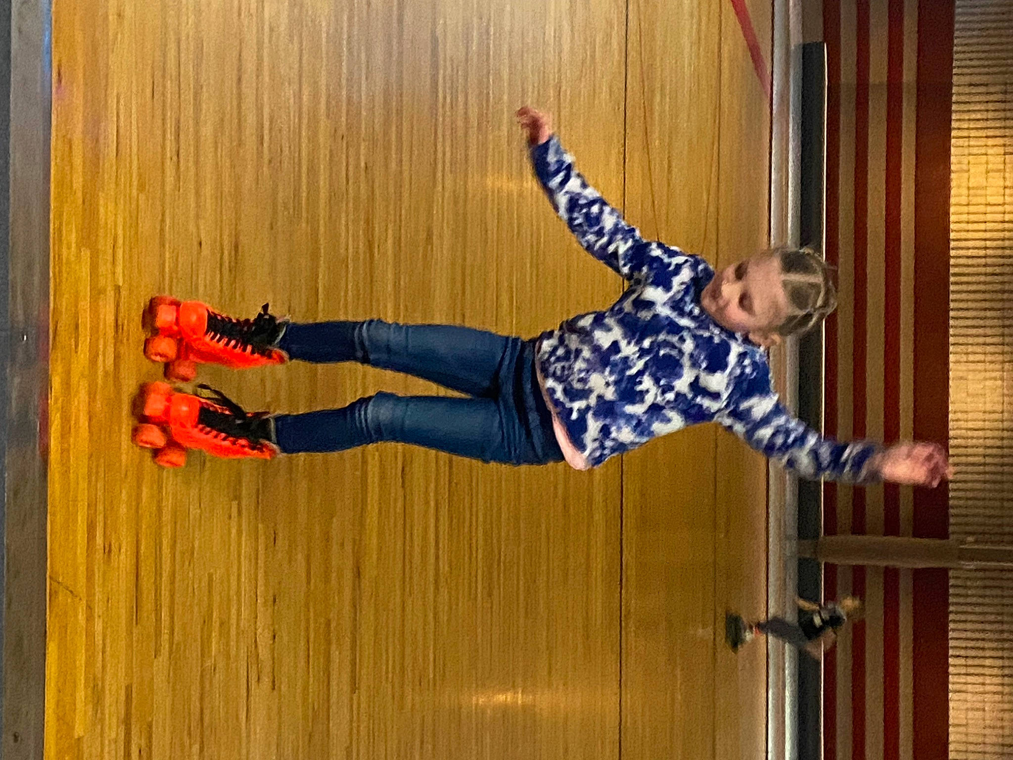 Izabelle joined the competition — help win amazing prizes! balance, child, denim, electric_blue, entertainment, event, flooring, fun, hardwood, human_leg, jeans, orange, pattern, performing_arts, person, sports, sportswear, trousers, walking_shoe, wood