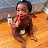 Armoni is registered to the contest to win money with this photo: biting, bodypart, child, cream, cutlery, dessert, face, female, finger, food, girl, hand, hardwood, head, icecream, person, photography, portrait, sitting, wood