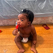 Armoni is registered to the contest to win money with this photo: baby, biting, bodypart, cream, cutlery, dessert, eating, face, finger, food, hand, hardwood, head, icecream, person, photography, portrait, sitting, spoon, wood