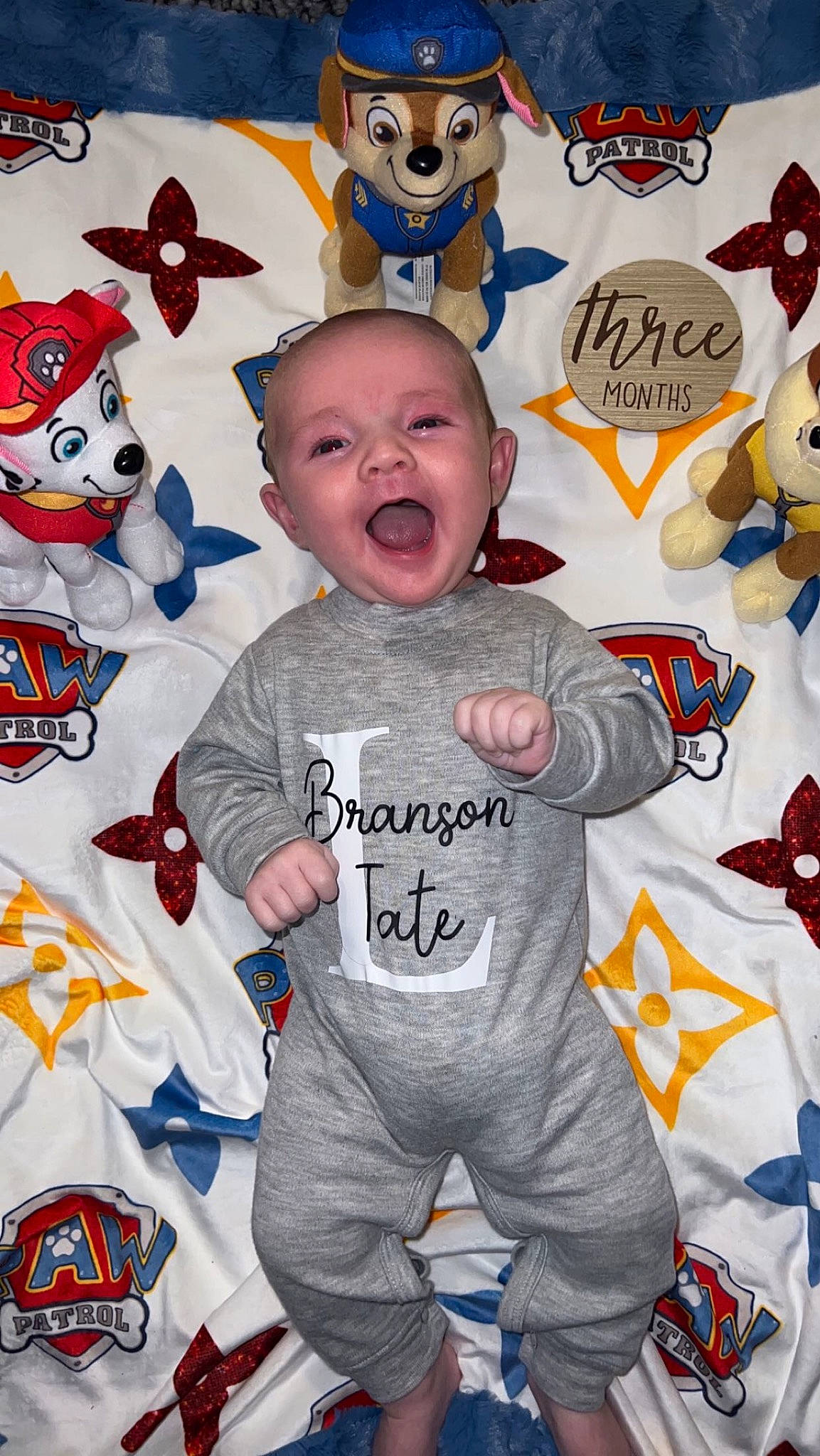Branson is registered to the contest to win money with this photo: art, baby_toddler_clothing, child, event, facial_expression, font, fun, happy, head, mammal, orange, person, product, red, sleeve, smile, t_shirt, textile, toddler, vertebrate