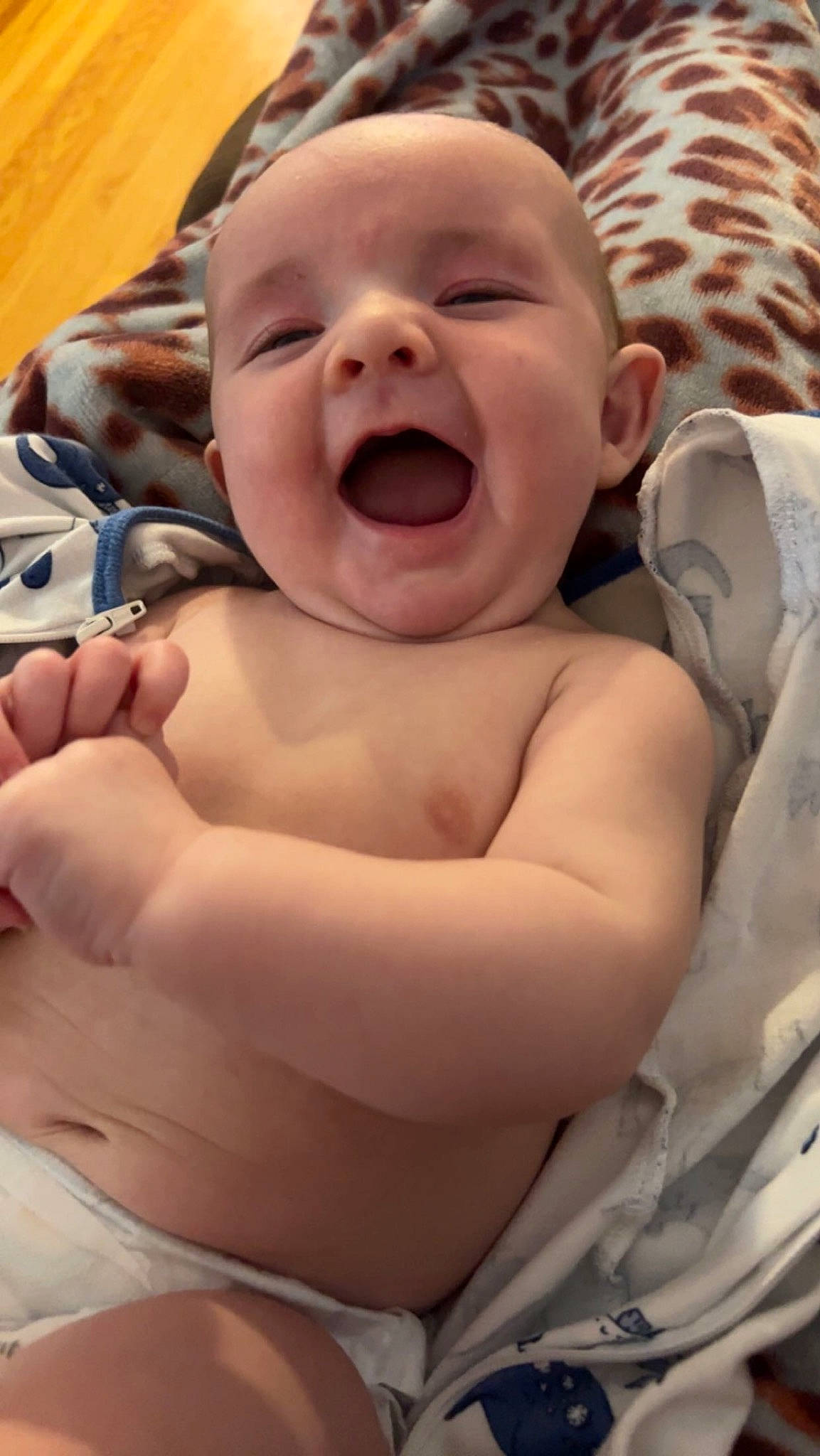 Branson is registered to the contest to win money with this photo: baby, baby_toddler_clothing, cheek, chest, child, chin, comfort, event, eye, finger, fun, gesture, happy, head, mouth, nose, person, skin, smile, thumb