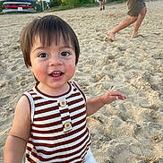 Antonio joined the competition — help win amazing prizes! beach, child, daytime, happy, kayaks, nature, outdoor, people, playful, portrait, sand, striped_clothing, summer, sunlight, tank_top, toddler, trees, walking, water_sports_equipment, white_shorts