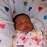 Jateenamarie is registered to the contest to win money with this photo: baby, blanket, butterfly_pattern, child, colorful, comfort, cozy, cushion, cute, heart_pattern, indoor, infant, newborn, peaceful, person, resting, sleeping, soft, warm, wrapped
