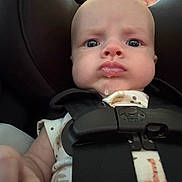 Kashton joined the competition — help win amazing prizes! baby, infant, car_seat, harness, drool, face, expression, serious, child, young, clothing, seatbelt, safety, cute, closeup, skin, person, head, indoors, black