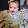 Ava joined the competition — help win amazing prizes! baby, child, smile, headband, toy, blanket, clothing, indoor, cute, portrait, infant, happy, sitting, young_child, accessory, soft_toy, fabric, person, closeup, cozy