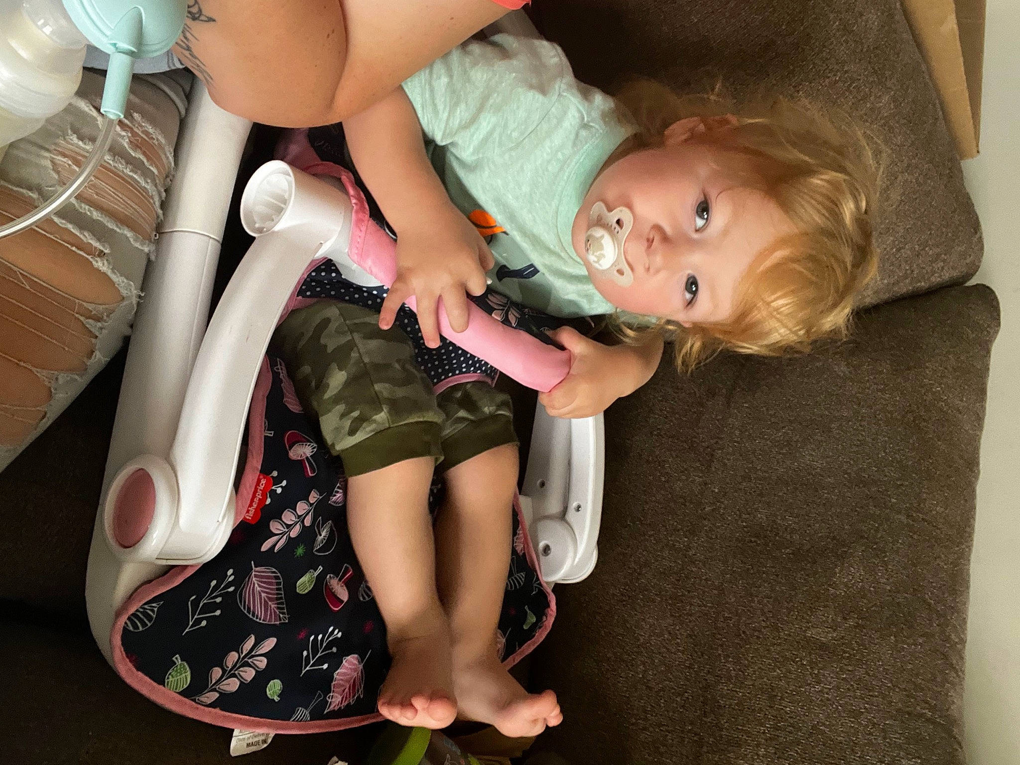 Grayson joined the competition — help win amazing prizes! baby, baby_carriage, baby_products, baby_toddler_clothing, car_seat, child, comfort, finger, fun, human_body, human_leg, lap, person, pink, sandal, sitting, sock, thigh, toddler, trunk