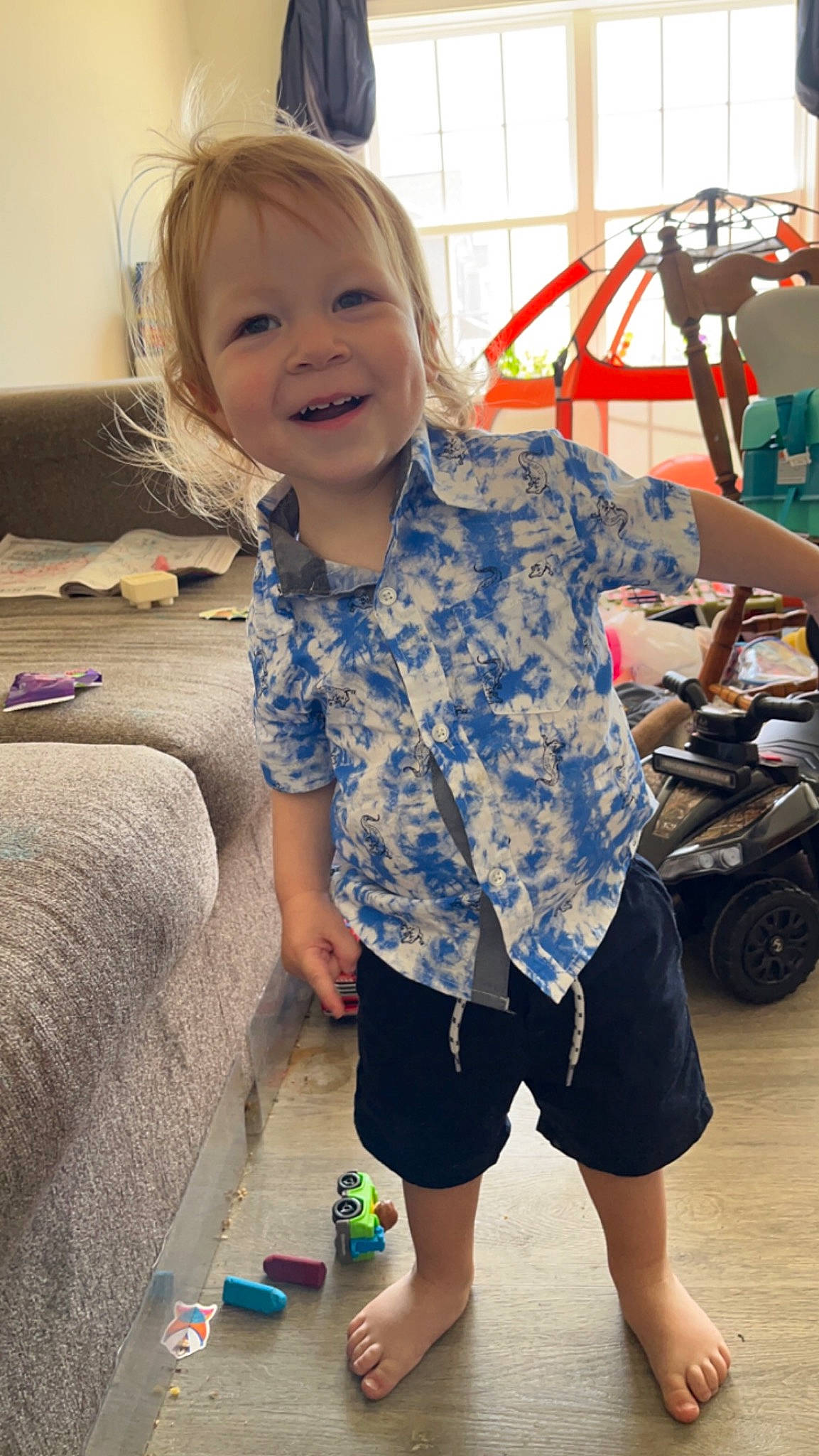 Grayson joined the competition — help win amazing prizes! automotive_tire, child, electric_blue, face, flooring, fun, hairstyle, happy, joy, leisure, person, shoulder, skin, sleeve, smile, standing, t_shirt, thigh, tire, toddler