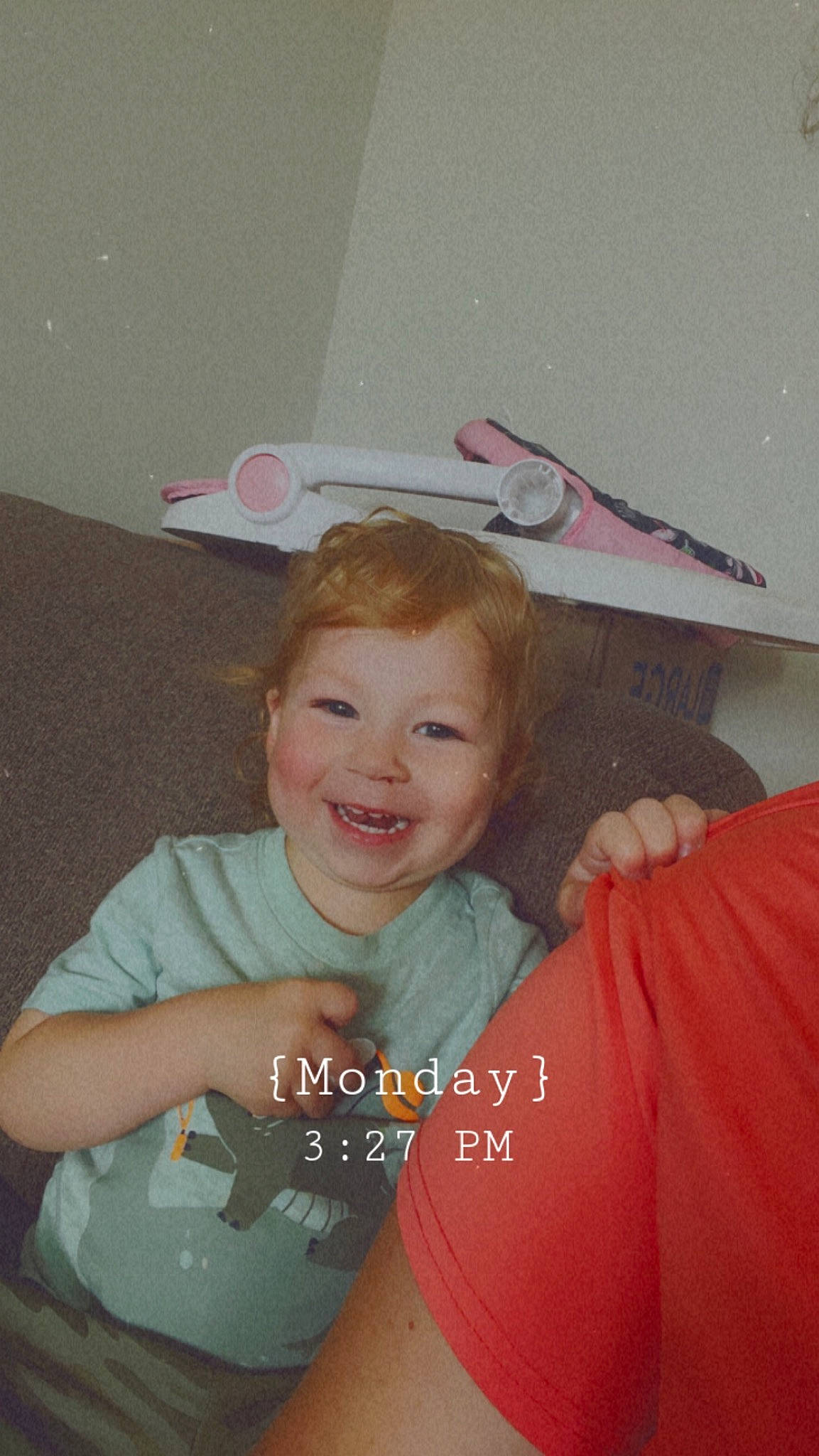 Grayson is registered to the contest to win money with this photo: chair, child, comfort, cool, fun, hairstyle, happy, joy, laugh, linens, mammal, paper_product, person, room, sitting, smile, t_shirt, thigh, toddler, vacation