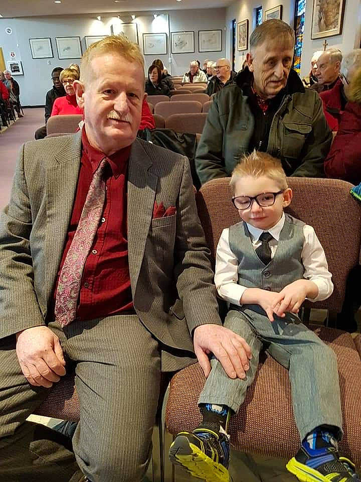 Stanley is registered to the contest to win money with this photo: event, gentleman, person, sitting