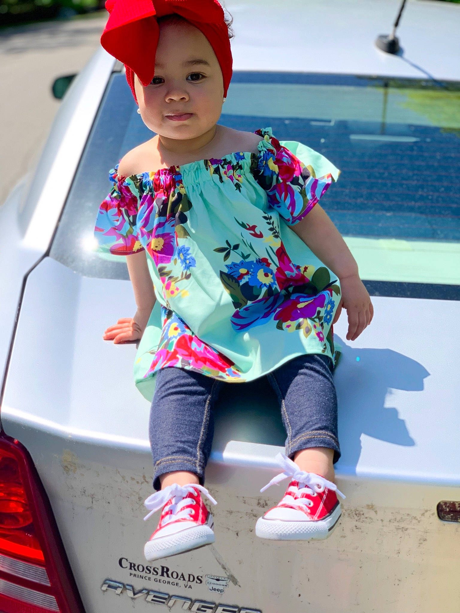 Amillia is registered to the contest to win money with this photo: car, child, child_model, clothing, family_car, headgear, person, style, t_shirt, toddler, vehicle, vehicle_door