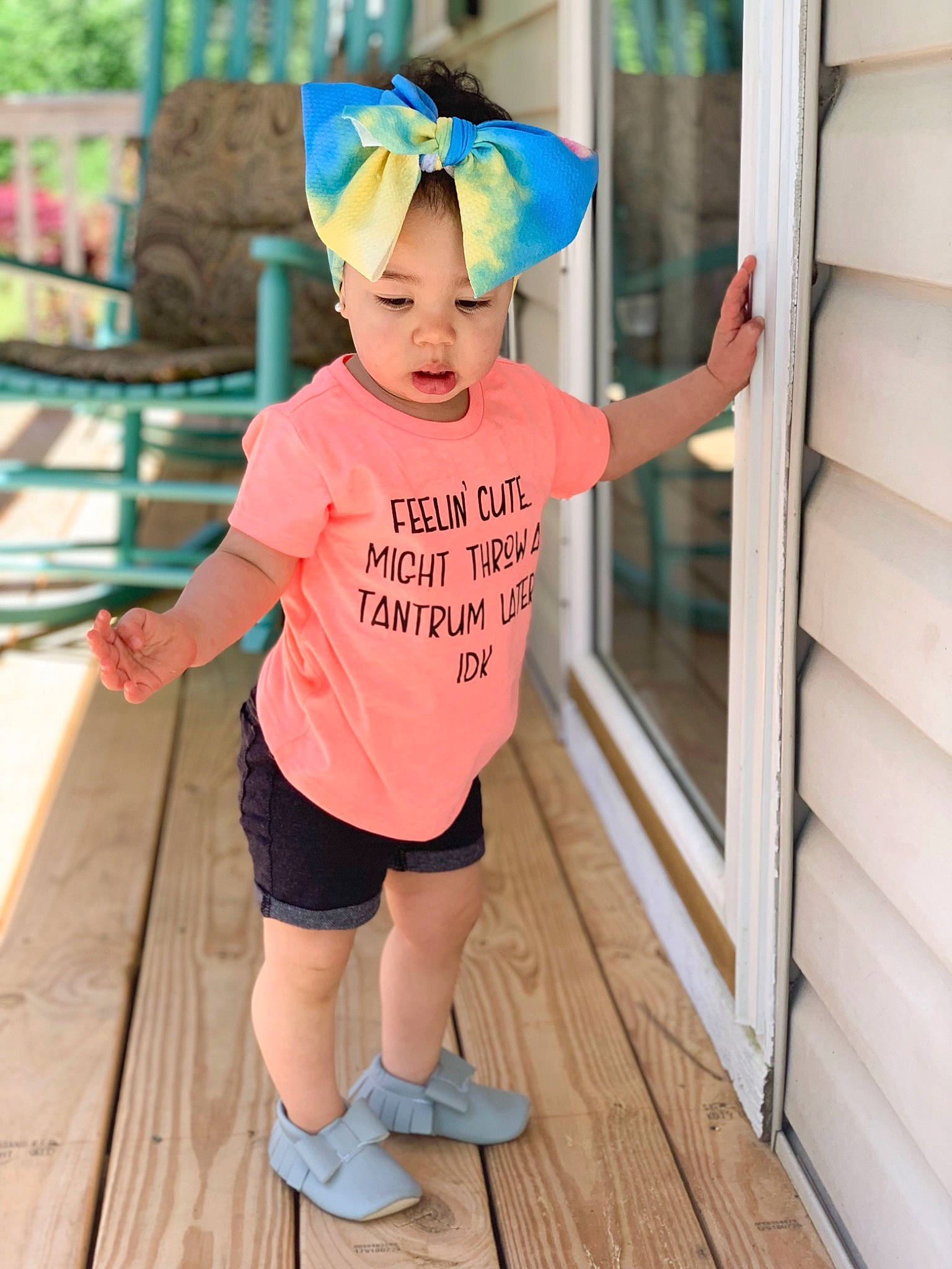 Amillia is registered to the contest to win money with this photo: baby_toddler_clothing, blue, cap, child, clothing, costume, happy, headgear, outerwear, pattern, person, personal_protective_equipment, pink, play, recreation, shorts, sleeve, t_shirt, toddler, vacation