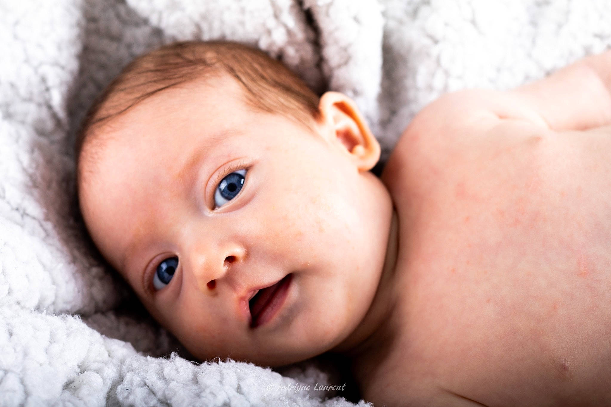 Mylan participe au concours pour gagner de l'argent avec cette photo : baby, baby_toddler_clothing, cheek, child, comfort, eye, eyebrow, eyelash, face, flash_photography, fur, happy, head, iris, lip, nose, person, photograph, portrait_photography, skin