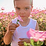 child, flower, pink_flower, white_tank_top, outdoor, nature, sunlight, lens_flare, garden, greenery, portrait, cute, young_child, summer, bloom, holding, hand, closeup, flora, sunny
