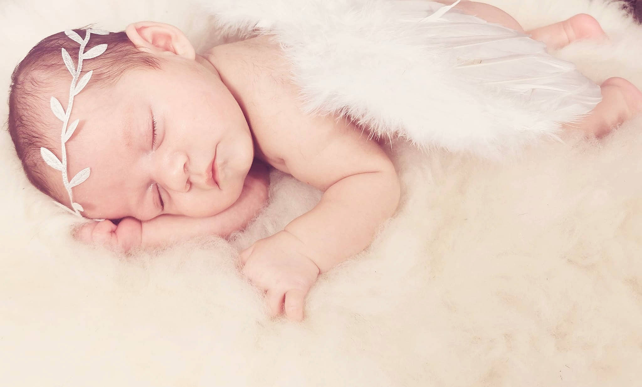 Ebony is registered to the contest to win money with this photo: baby, baby_sleeping, barefoot, bedding, child, comfort, eyelash, fashion_accessory, flash_photography, flesh, flooring, foot, fur, fur_clothing, hair_accessory, happy, iris, linens, person, portrait_photography
