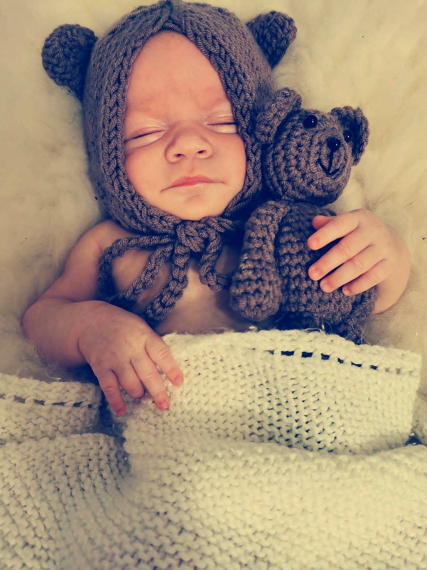 Ebony is registered to the contest to win money with this photo: azure, baby, baby_sleeping, baby_toddler_clothing, child, comfort, finger, hand, headwear, linens, organ, pattern, person, product, sitting, skin, sleeve, textile, thumb, toddler