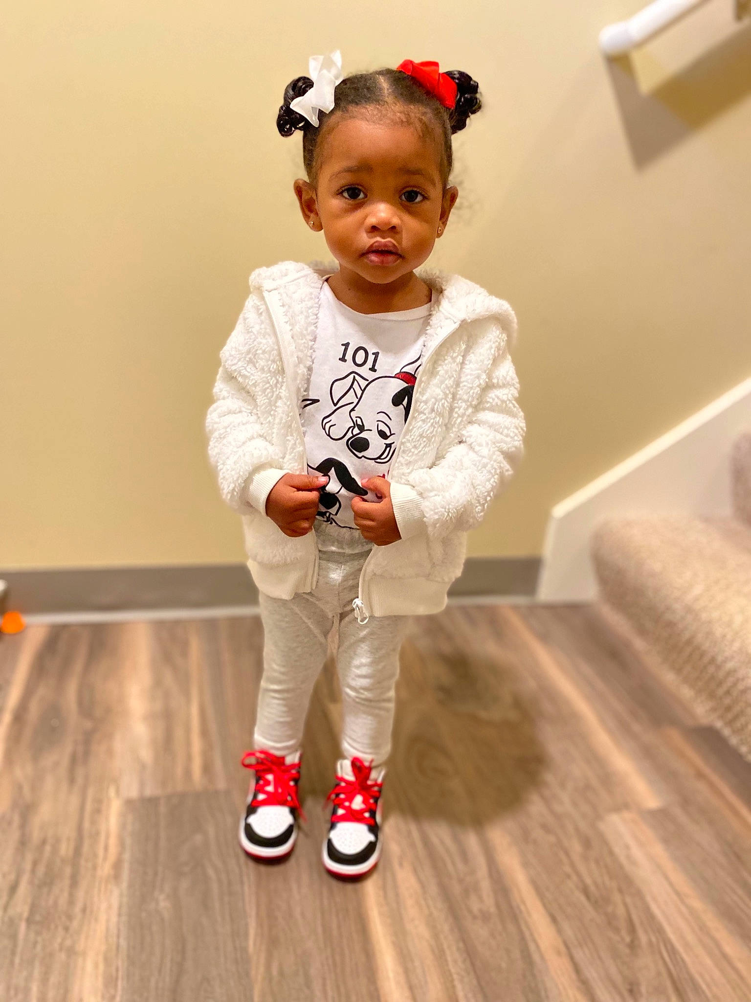 Sincere is registered to the contest to win money with this photo: baby, baby_toddler_clothing, carmine, costume, face, fashion_accessory, fashion_design, floor, flooring, fun, happy, hardwood, human_leg, knee, laminate_flooring, person, sleeve, sportswear, toddler, wood