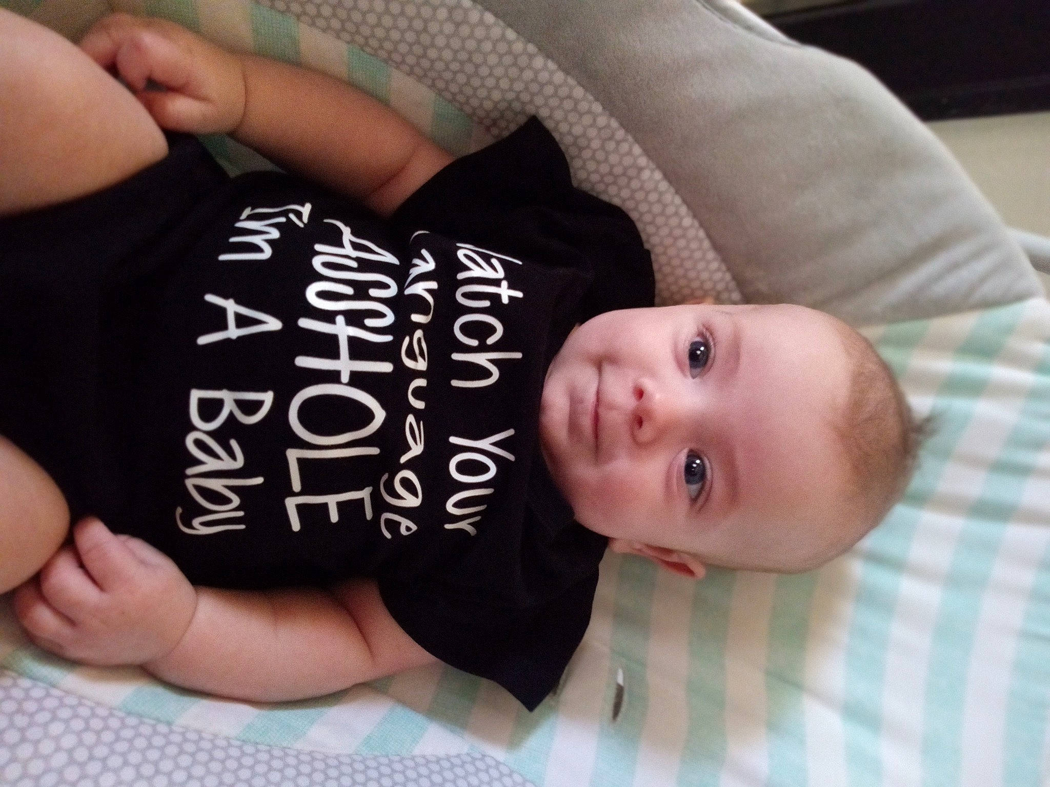 Bensyn is registered to the contest to win money with this photo: baby, baby_toddler_clothing, cheek, chest, child, comfort, elbow, eyelash, finger, font, gesture, hand, nail, pattern, person, product, skin, sleeve, thumb, toddler