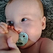 Aedin joined the competition — help win amazing prizes! baby, pacifier, foot, hand, face, skin, child, infant, cute, closeup, blanket, pattern, lying_down, cheeks, expression, nibble, soft_skin, indoors, young, curiosity