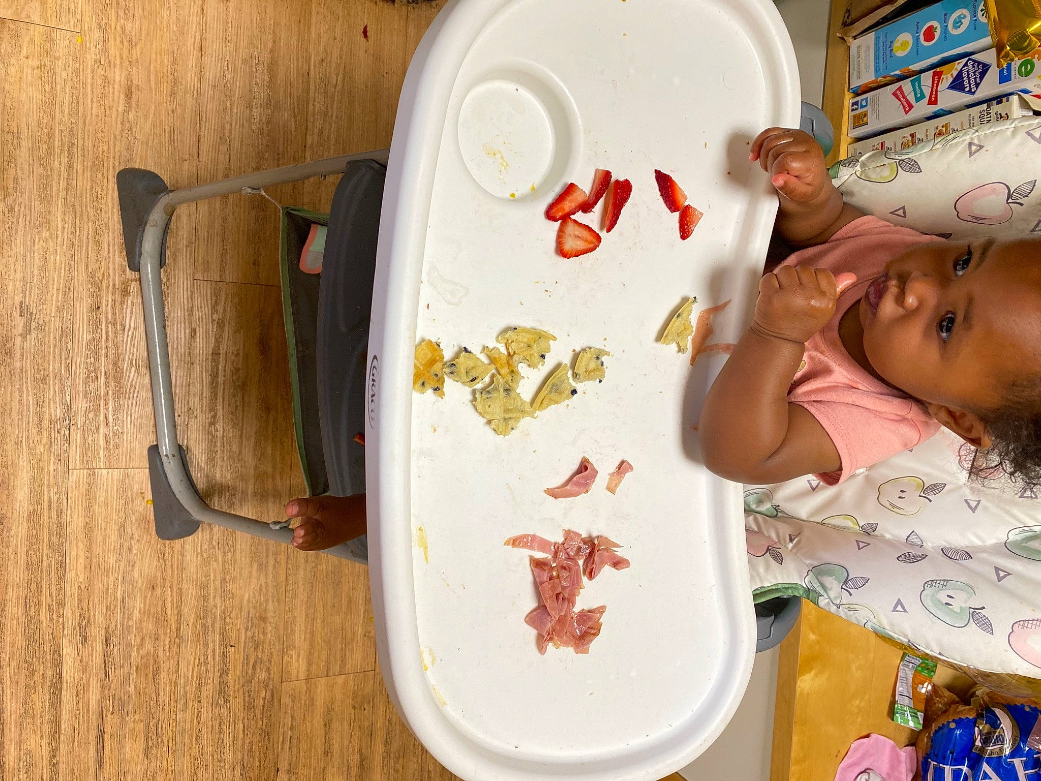 Kathryn is registered to the contest to win money with this photo: art, baby, child, comfort_food, dishware, drinkware, hardwood, hat, home_accessories, illustration, pattern, person, plate, porcelain, room, serveware, table, toddler, visual_arts, wood