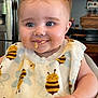 Paisley is registered to the contest to win money with this photo: animal, baby, bee, bodypart, cream, cutlery, dessert, eating, face, food, furniture, head, honeybee, icecream, insect, invertebrate, person, photography, portrait, spoon