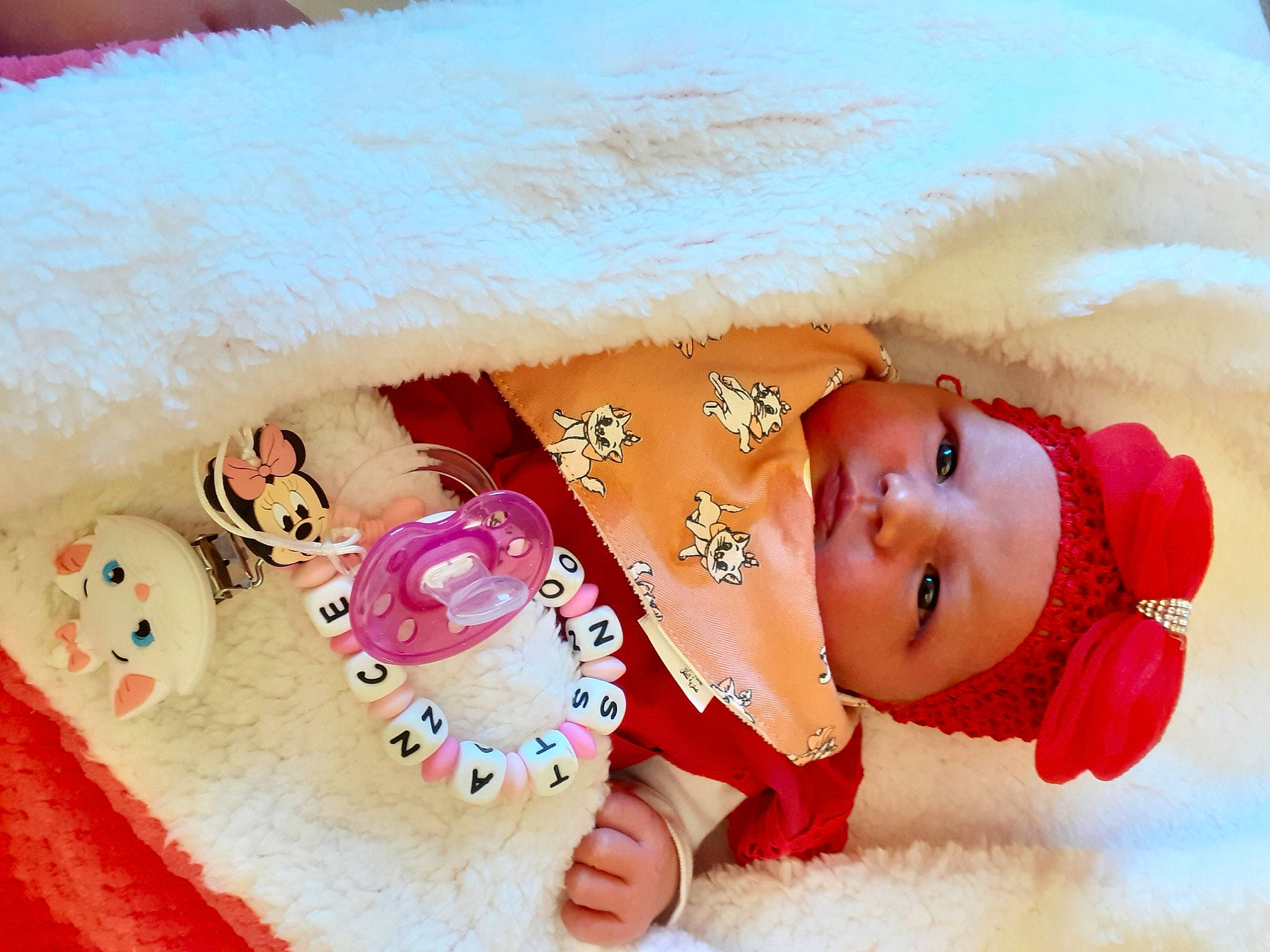 Constance a rejoint le concours — aidez-le/la à gagner de superbes lots ! art, baby, baby_products, baby_toddler_clothing, baby_toys, child, doll, fashion_accessory, happy, headgear, headwear, linens, nose, person, pink, smile, stuffed_toy, textile, toddler, toy