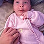 Valerie joined the competition — help win amazing prizes! baby, infant, hand, pink_clothing, fleece, bed, blanket, person, cute, face, eyes, expression, skin, newborn, child, portrait, sleepwear, tender, holding_hand, soft