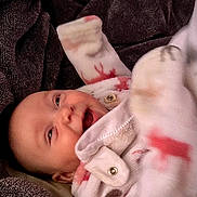 Valerie joined the competition — help win amazing prizes! baby, smile, blanket, fleece, cozy, infant, happy, warm, clothing, button, face, child, soft, portrait, cute, snug, indoor, comfort, toddler, expression