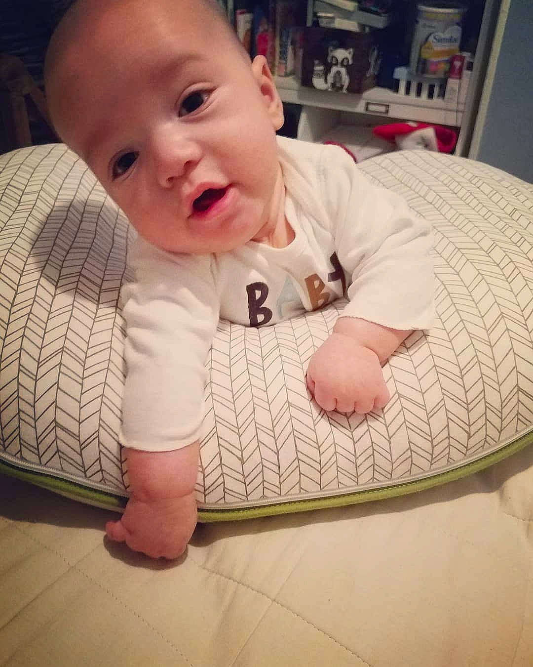 Raul is registered to the contest to win money with this photo: arm, cheek, child, day, ear, eye, finger, flooring, girl, hand, infant, leg, mouth, nose, person, product, sitting, skin, textile, thumb