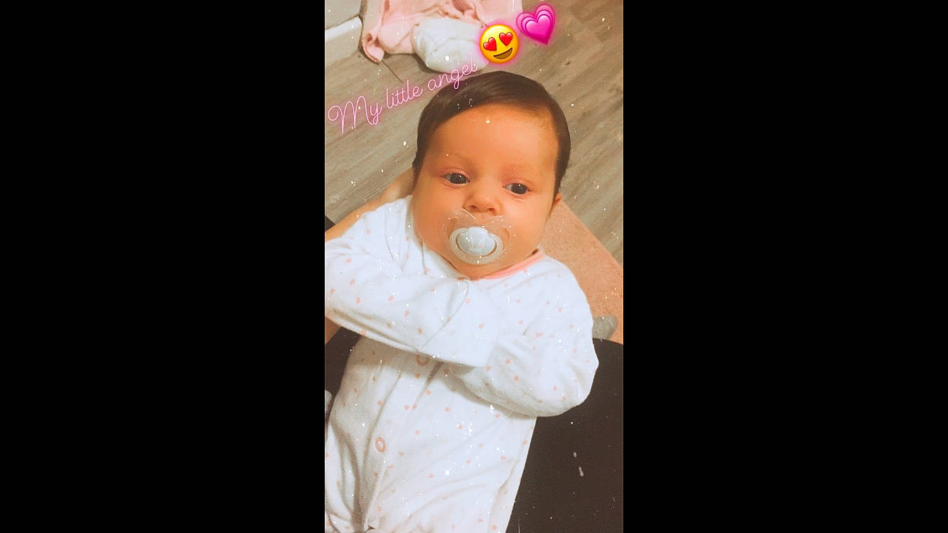 Iyla Rose is registered to the contest to win money with this photo: baby, cheek, child, finger, fun, hand, happy, head, mouth, nose, person, pink, skin, smile, toddler