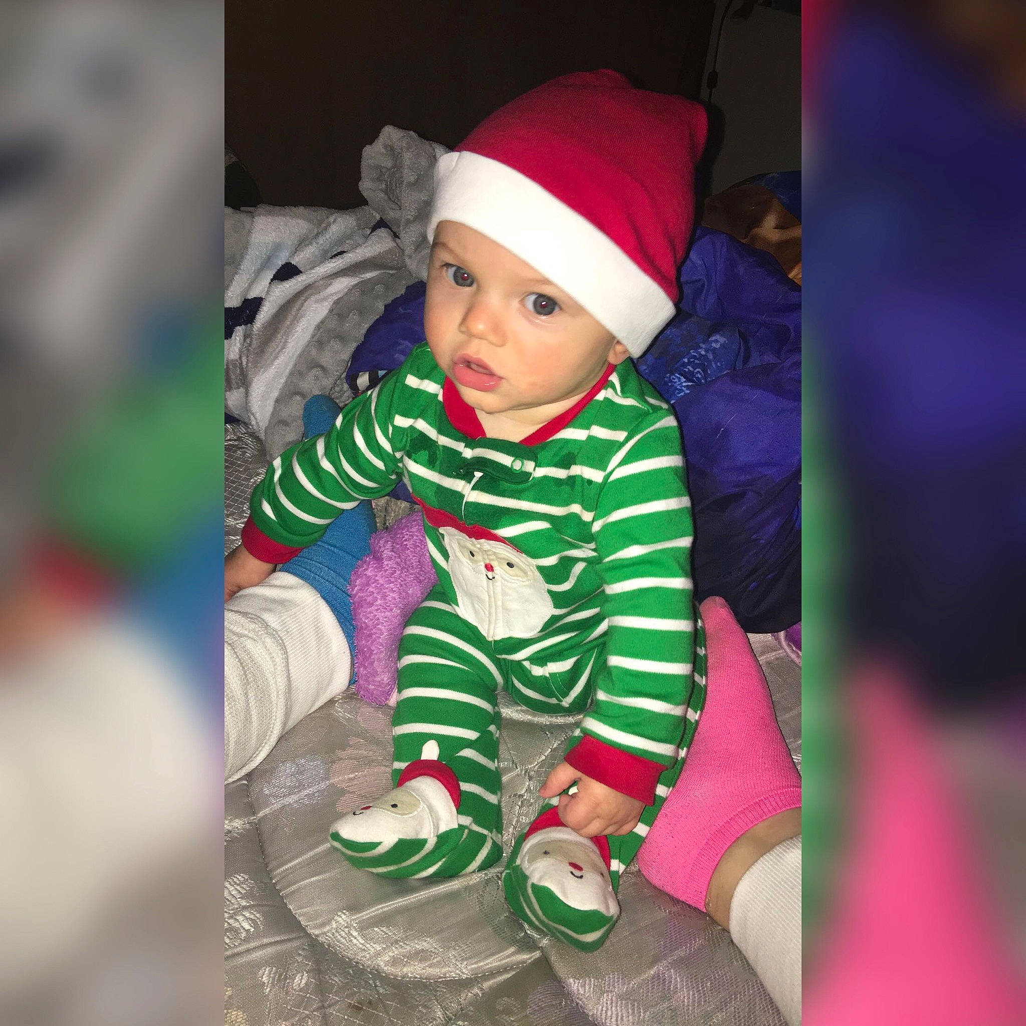 Bernie is registered to the contest to win money with this photo: beanie, cap, child, christmas, event, fun, green, headgear, headwear, holiday, infant, person, pink, product, red, skin, smile, toddler