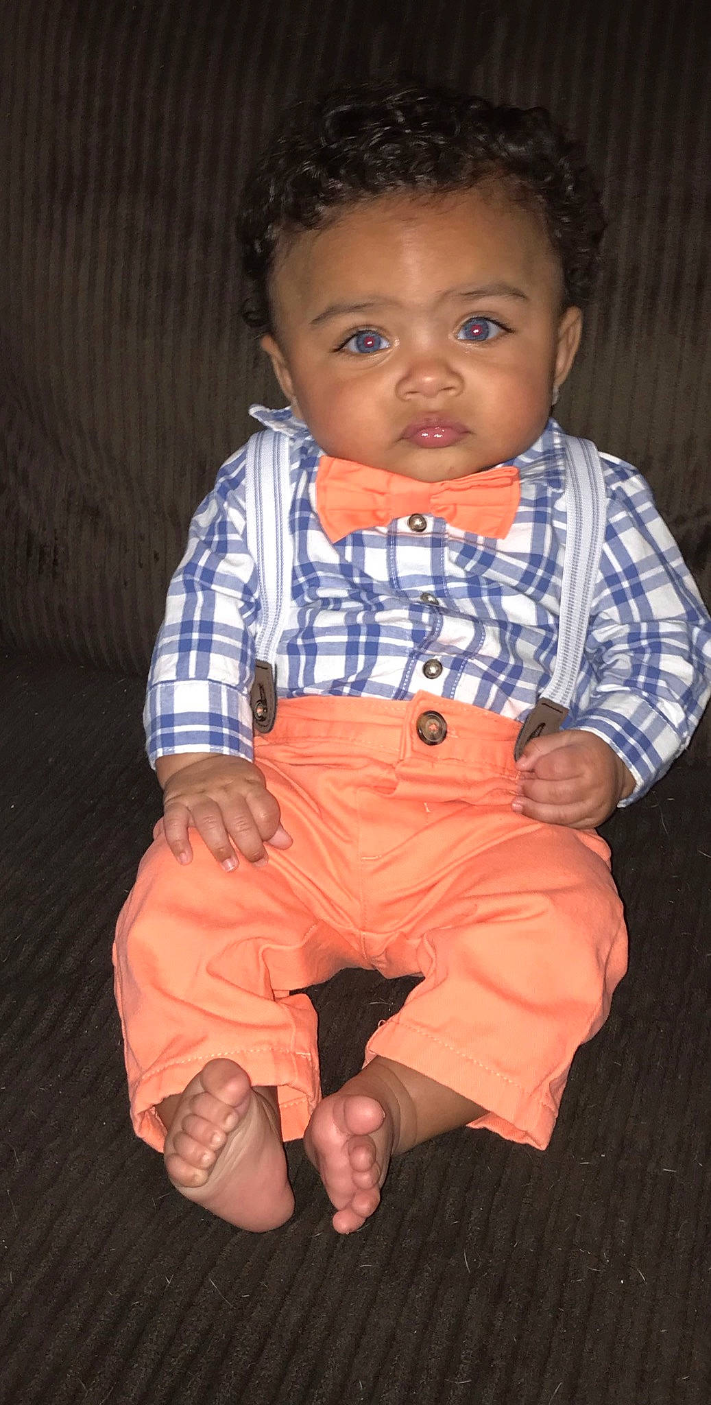 Anthoni is registered to the contest to win money with this photo: baby, baby_toddler_clothing, cheek, chin, eye, face, finger, flash_photography, hand, happy, head, human_body, iris, lip, mouth, nose, orange, person, skin, sleeve