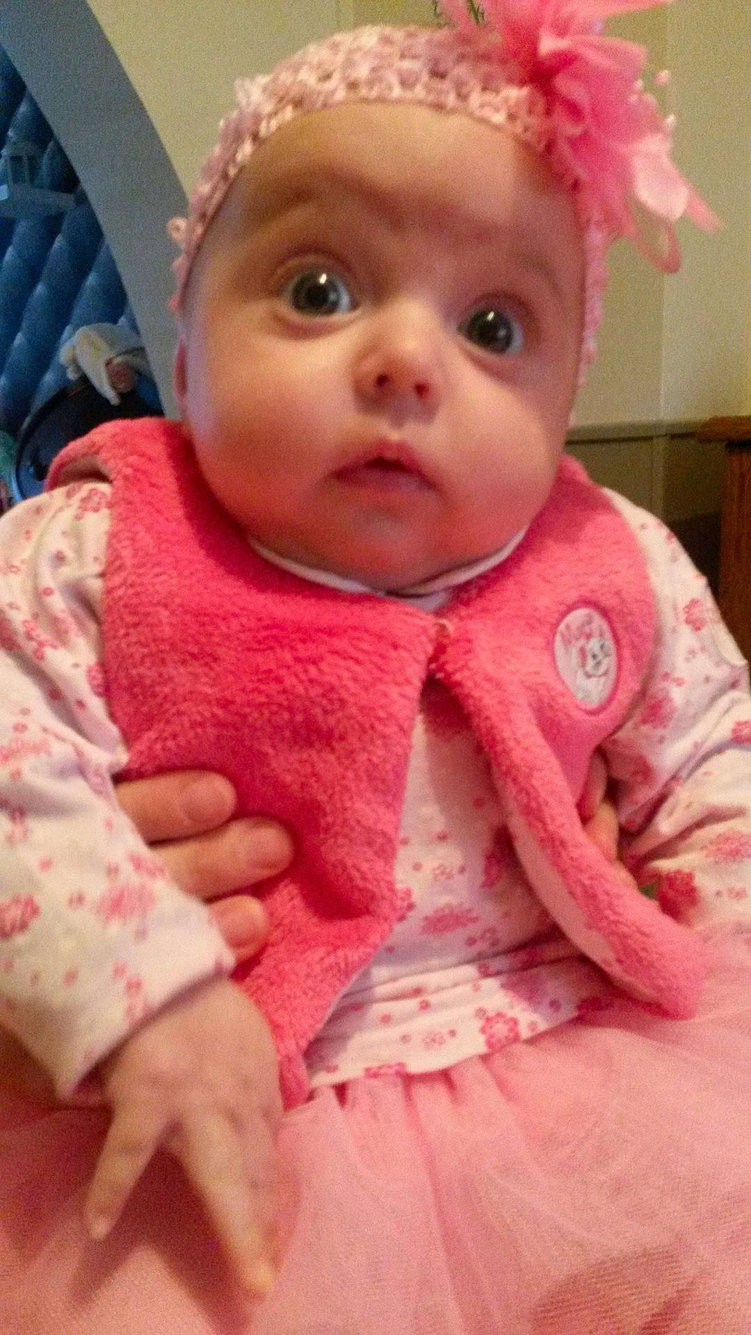 Leonie participe au concours pour gagner de l'argent avec cette photo : child, clothing, doll, eye, face, head, infant, organ, person, pink, skin, toddler, toy