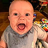 Westin joined the competition — help win amazing prizes! baby, child, smiling, messy_face, bib, highchair, indoor, toy, can, happy, cute, infant, mouth_open, blue_eyes, clothing, person, home, table, play, joy