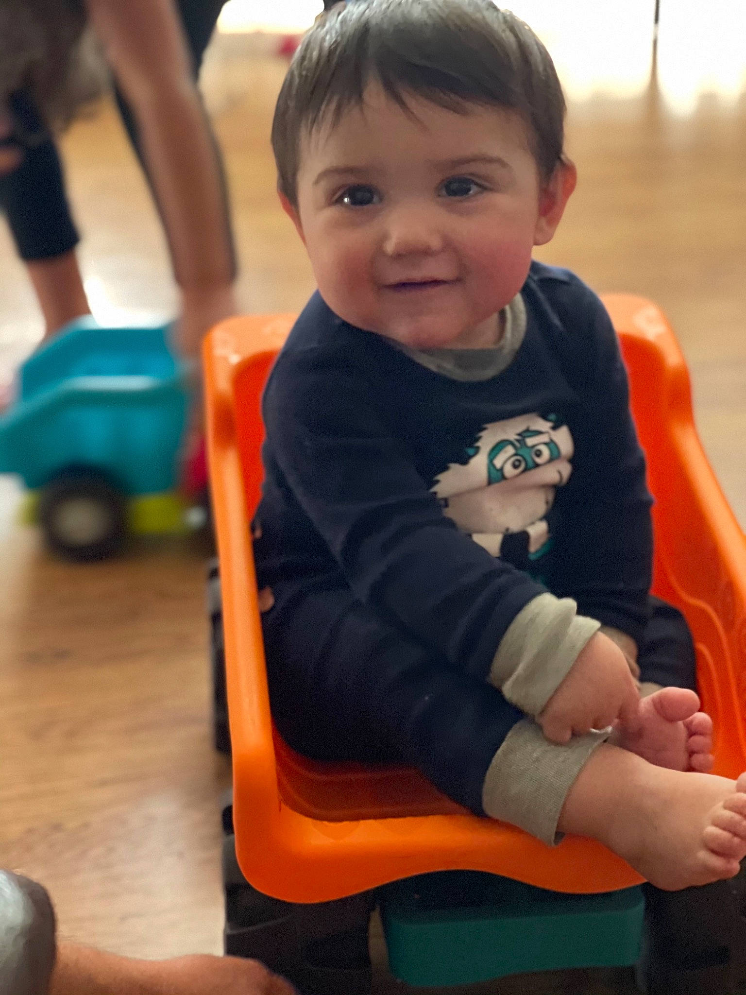 Liam is registered to the contest to win money with this photo: baby, baby_toddler_clothing, chair, child, comfort, facial_expression, finger, fun, hairstyle, happy, head, joy, leisure, person, product, recreation, skin, smile, standing, summer