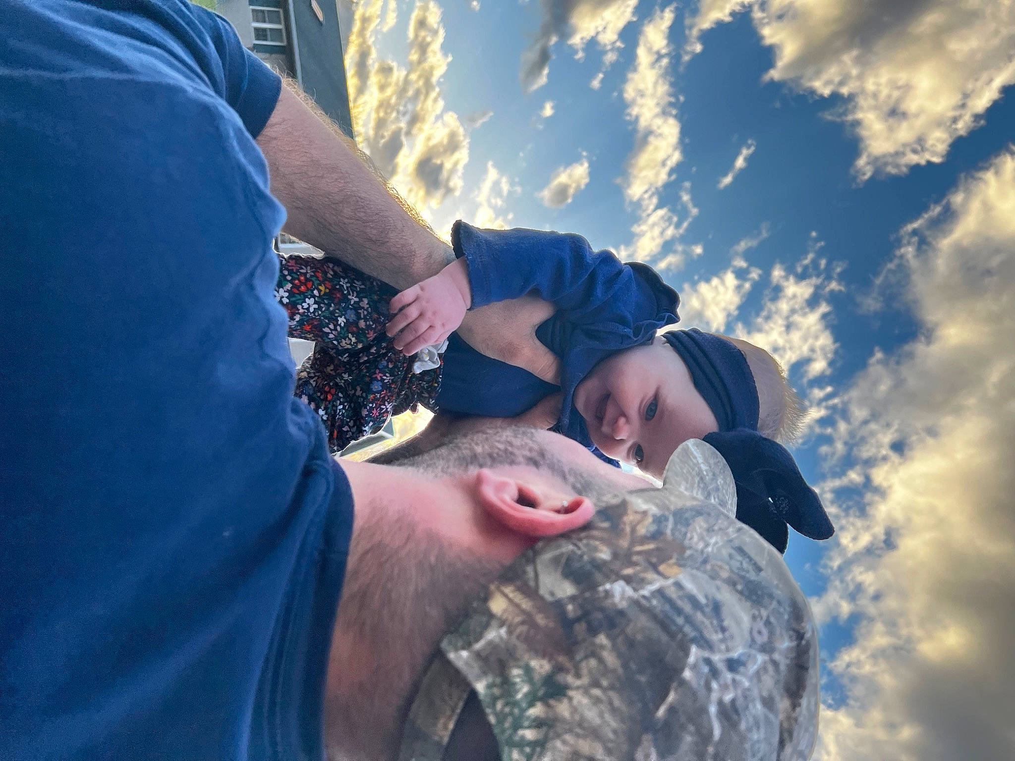 Amelia is registered to the contest to win money with this photo: cloud, cumulus, electric_blue, flash_photography, fun, gesture, hand, happy, headwear, landscape, leisure, meteorological_phenomenon, people, people_in_nature, person, plant, recreation, rock, sky, t_shirt