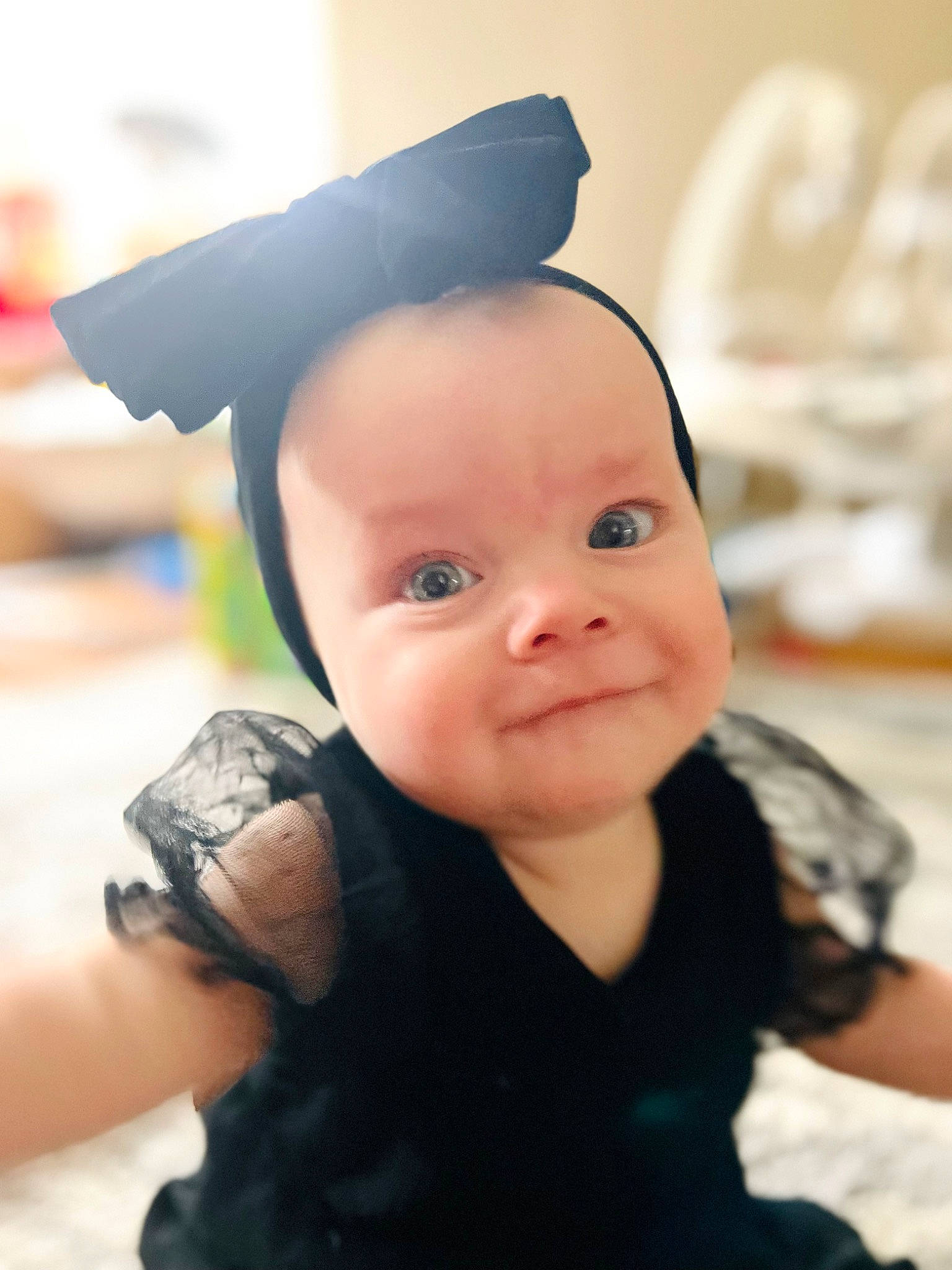Sofia is registered to the contest to win money with this photo: baby, baby_toddler_clothing, cap, child, costume_accessory, costume_hat, eyelash, fashion_accessory, finger, flash_photography, fun, gesture, happy, hat, joy, person, sitting, skin, sleeve, smile