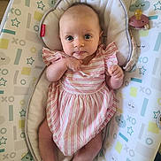 Penelope joined the competition — help win amazing prizes! baby, infant, child, pink_dress, striped_clothing, baby_seat, pastel_colors, patterned_fabric, face, eyes, hands, legs, footwear, pacifier, toy, comfort, indoor, portrait, cute, expression